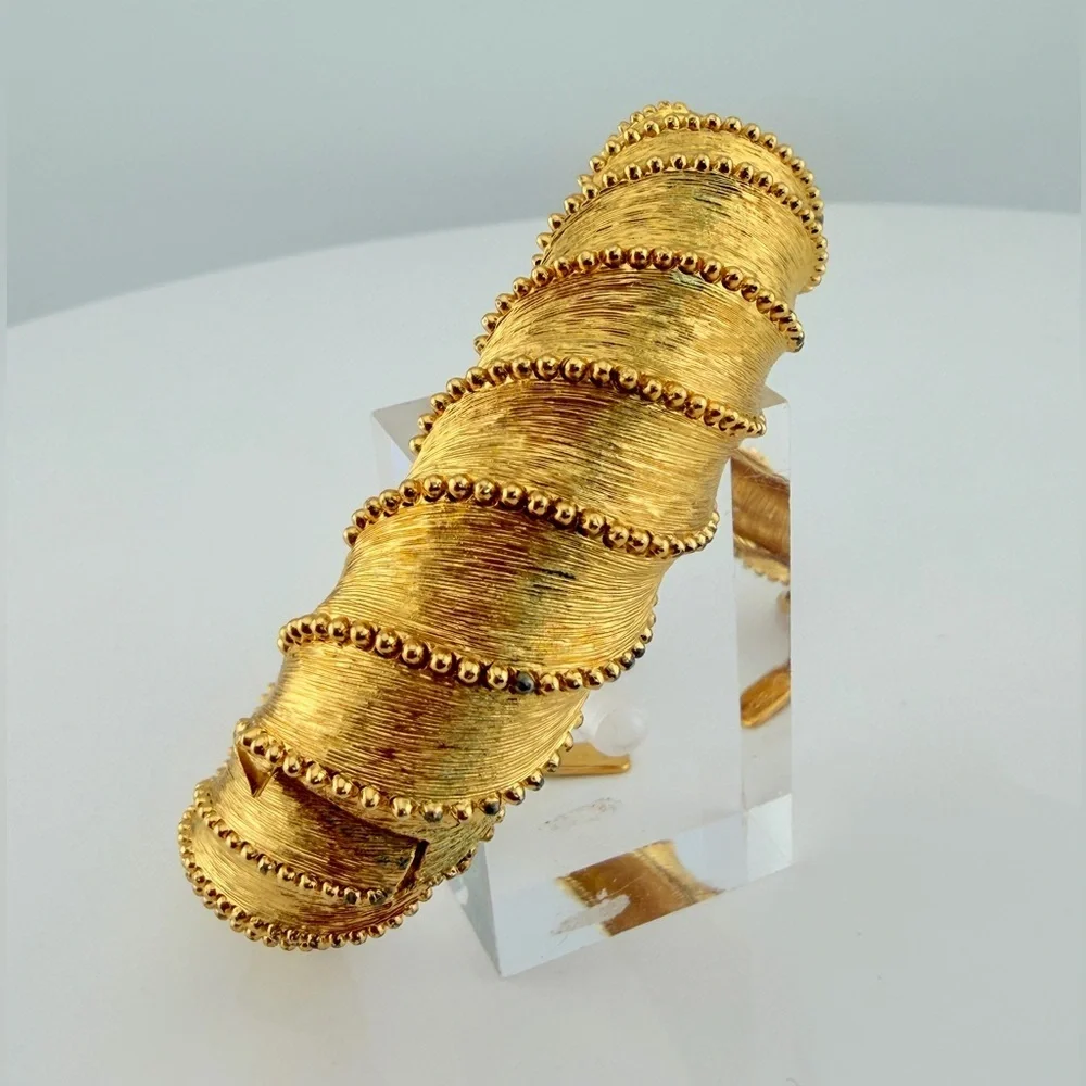 Vintage Monet textured gold bangle bracelet 1960-1970s